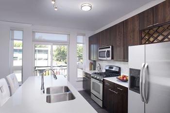 Kitchen with wooden cabinets